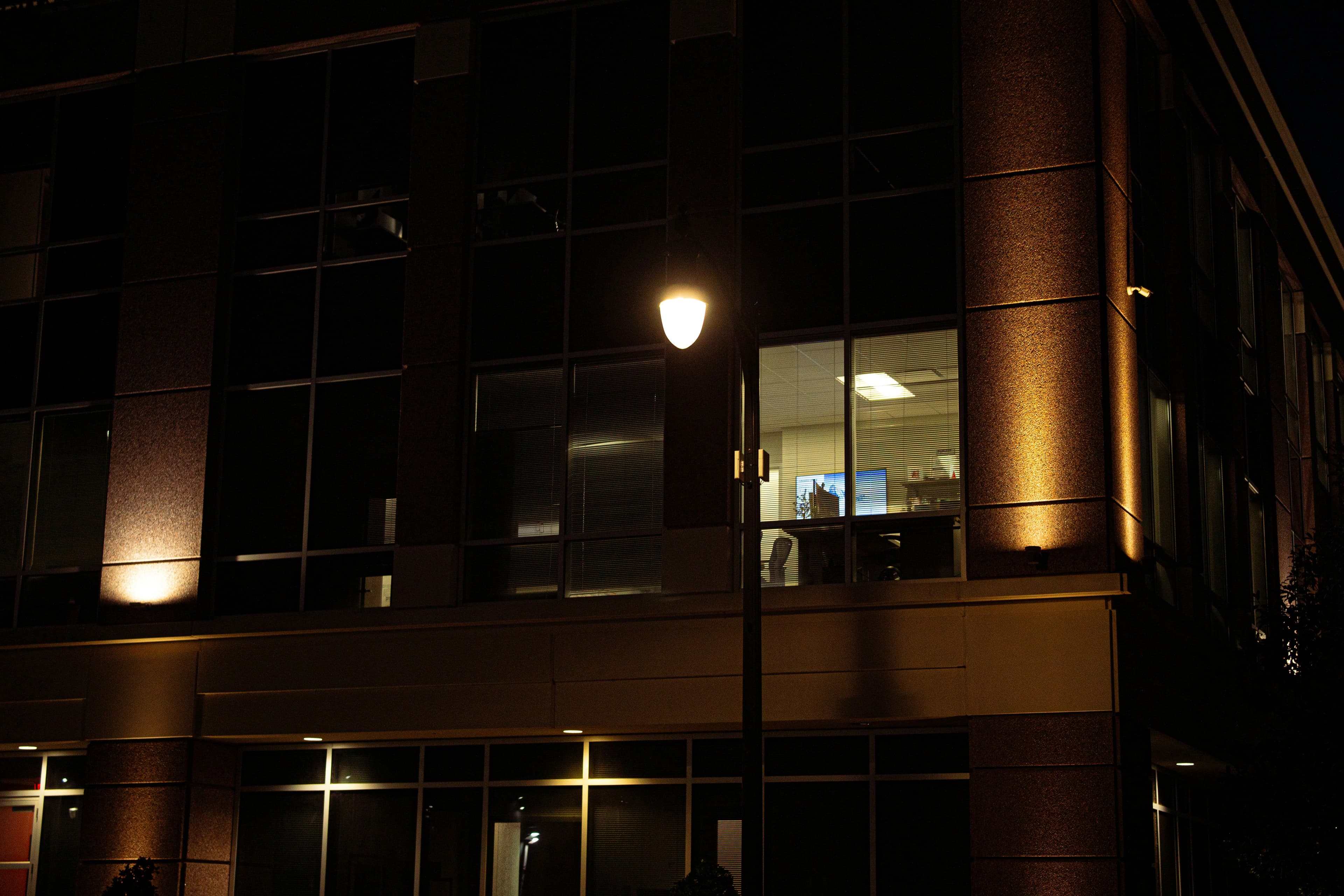 A single lit window at night